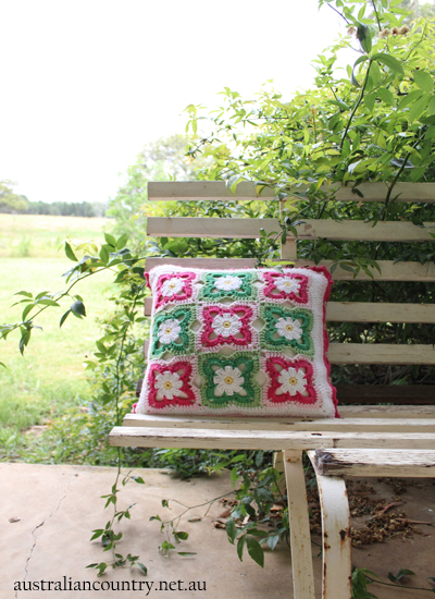 pink green flower cushion outside